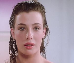 Kelly LeBrock nude - The Woman in Red (1984)