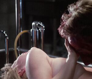 Barbara Crampton nude - Re-Animator (1985)