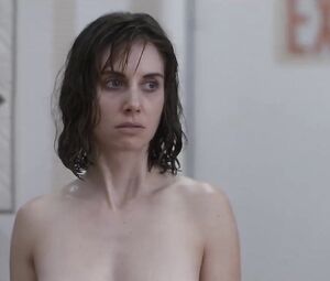 Alison Brie comes out of shower and ends up naked in store in Horse Girl (2020)