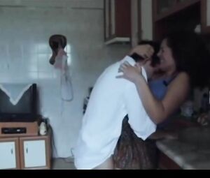 Sexually attractive MILF hooks up with the stepson's friend in kitchen and bedroom