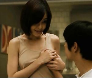 Asian piano teacher takes students hands and puts on small tits in Korean feature movie