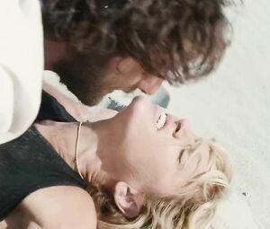 Madonna nude trusts guy with body and makes it on the beach in Swept away (2002)
