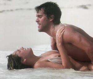 Kelly Brook flirts with the brutal young man and has hard sex in Survival Island