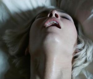 Nothing excites Noomi Rapace as much as cunnilingus in What Happened to Monday? (2017)