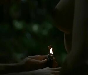 Smoking MILF in obscene moment from feature film where guy sneaks into her snatch